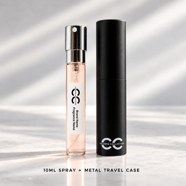 A 10ml perfume spray bottle filled with pink liquid stands next to its tall black metal travel case on a light marble surface with soft diagonal shadows. The bottle has a silver spray top and a white label with black text, and the case is branded &