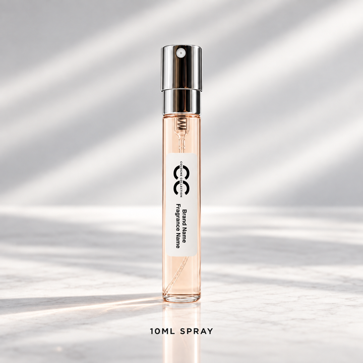 A 10ml travel perfume spray bottle with a silver atomizer cap, filled with a peach-coloured perfume. The bottle features a minimalist black logo and text on the front.
